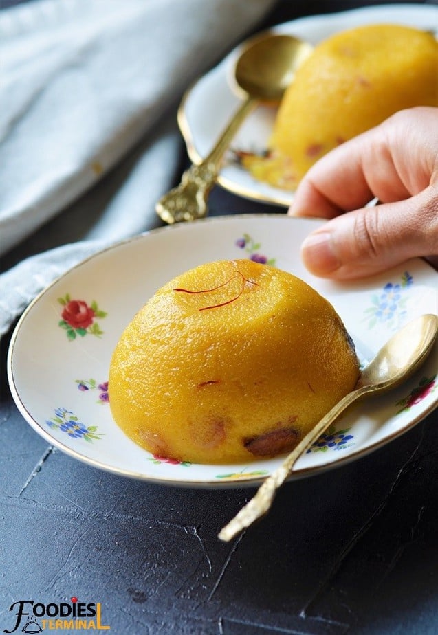 Mango Kesari on a plate with saffron strands 