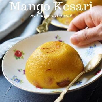 Mango kesari in a white floral plate