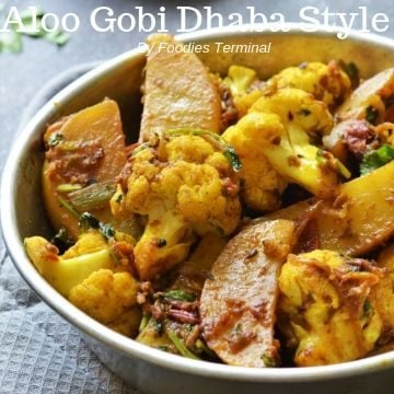aloo gobi dhaba style served in a metal plate