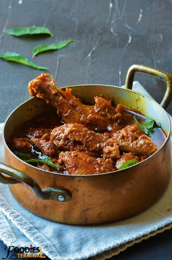 Spicy Chicken Madras recipe in a pot with brass handles