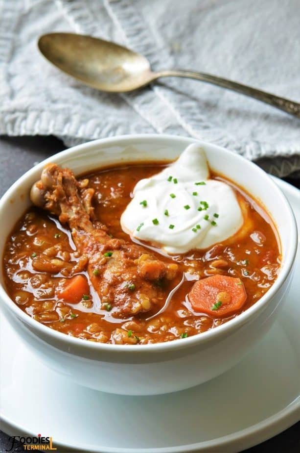 Chicken lentil stew with dollop of cream