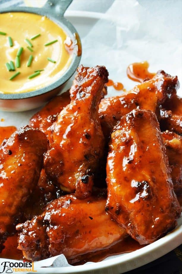 Spicy Honey sriracha wings baked & in spicy sauce