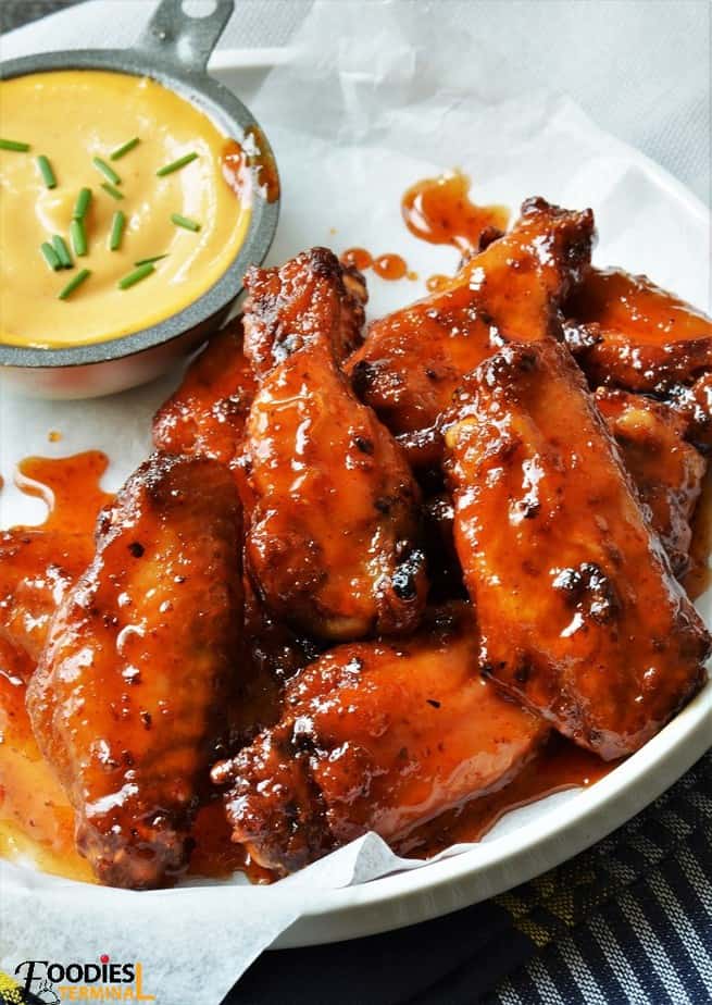 Sriracha sauce & honey coated wings baked with mayo dip by the side