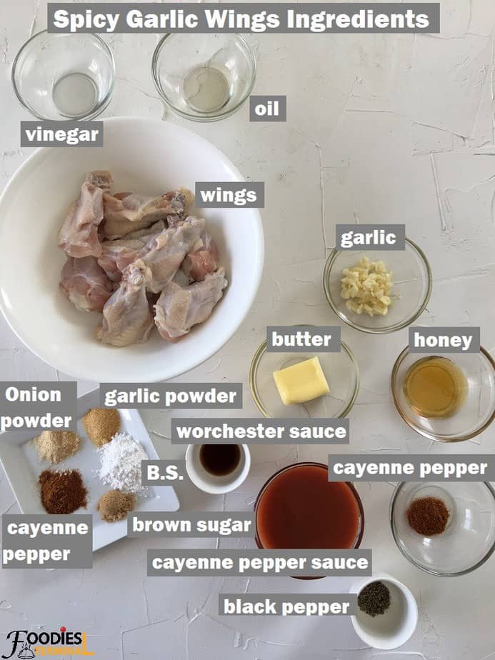 Recipe ingredients in bowls on a white board