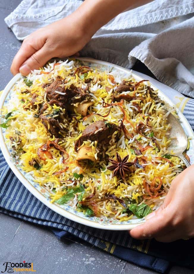 Easy Mutton Biryani recipe served in an oval plate