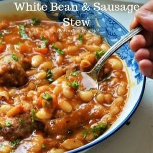 Creamy bean and sausage stew in a bowl