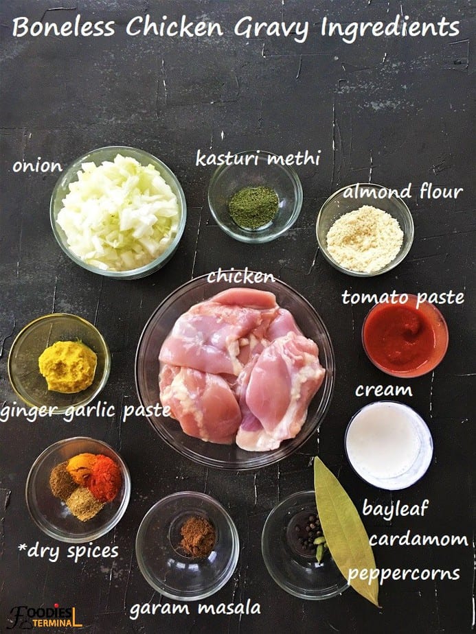 Boneless chicken gravy indian style ingredients in bowls