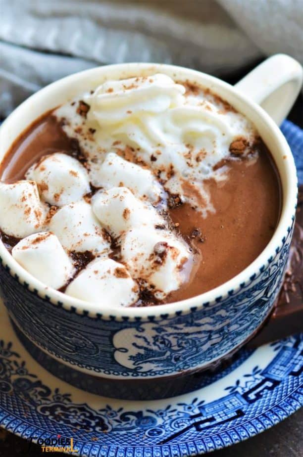 Instant pot hot chocolate recipe served with whipped cream & marshmallows