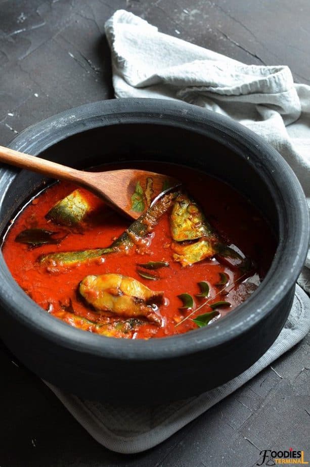Spicy Indian kerala fish curry restaurant style in an earthen pot