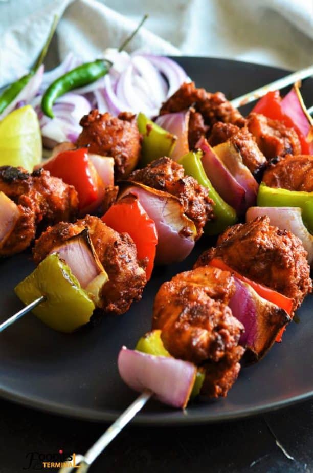 Chicken Tikka Kebab served with onion slices