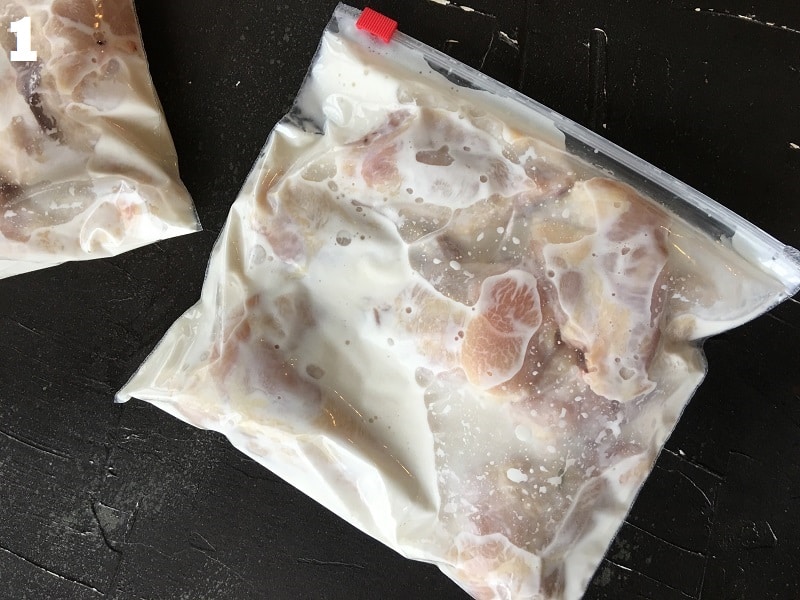 chicken wings soaked in buttermilk in ziplock bag