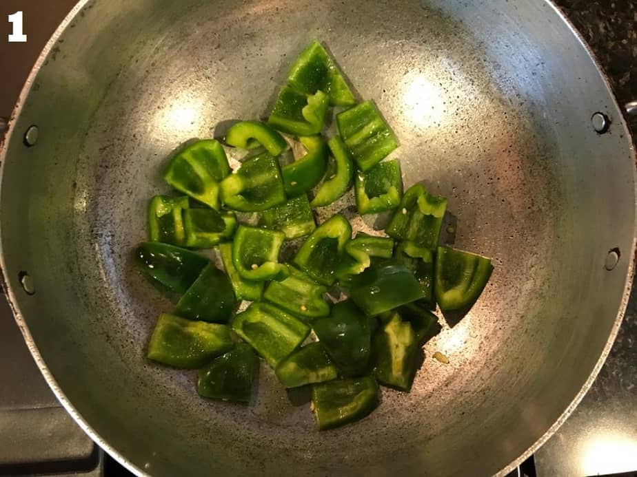 frying capsicums for aloo shimla mirch sabzi