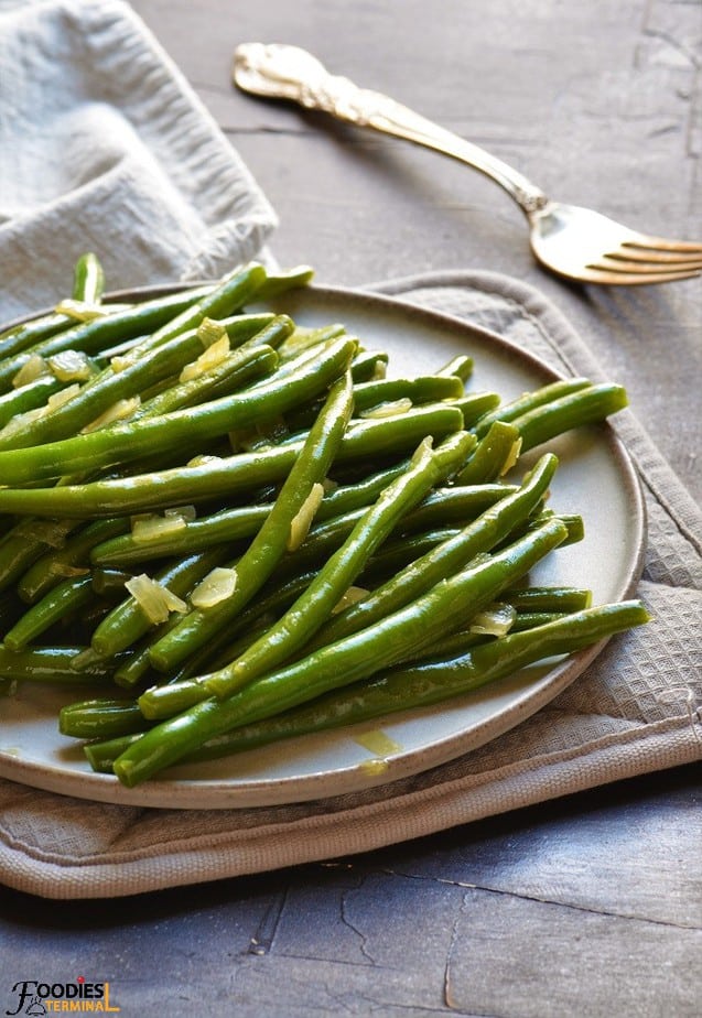 Instant Pot Green Beans on a plate with a fork