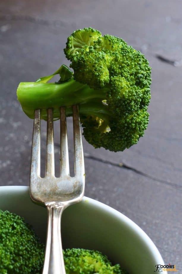 instant pot steamed broccoli in a fork