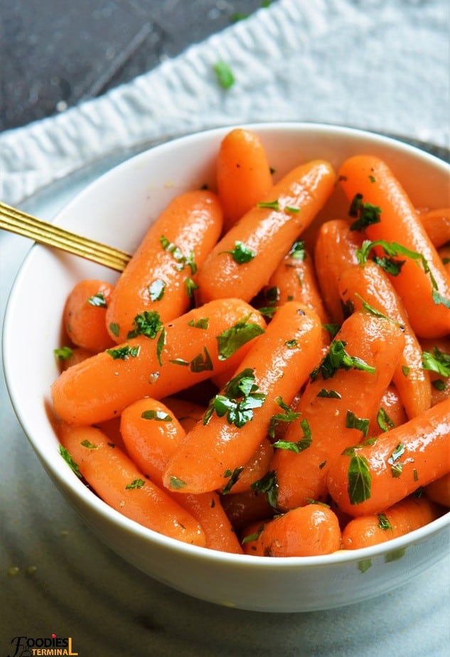 Instant pot steamed carrots garnished with parsley