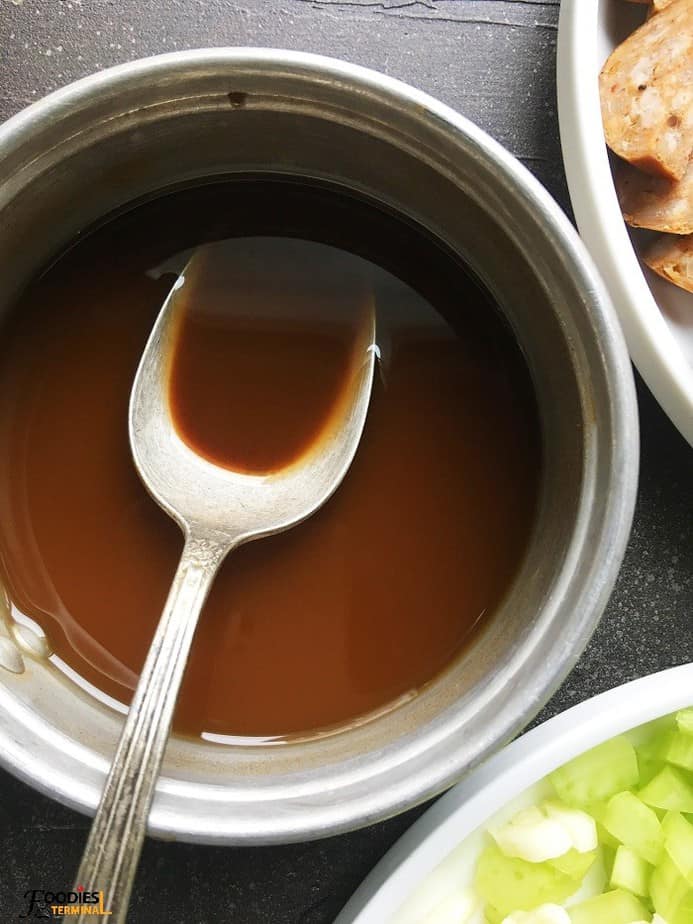 Gumbo base in a pot with spoon