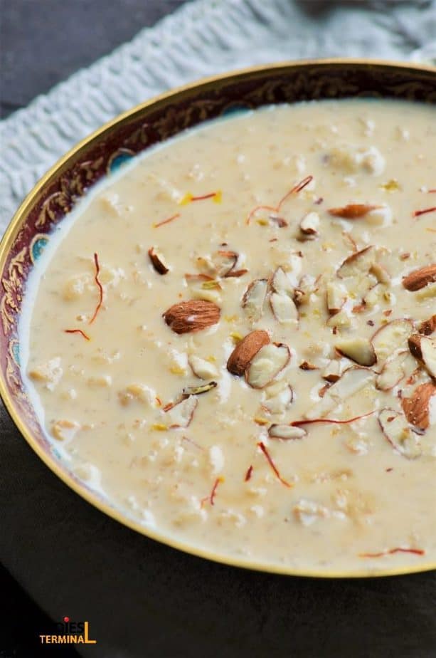 Pressure cooker rice kheer garnished with saffron & almonds