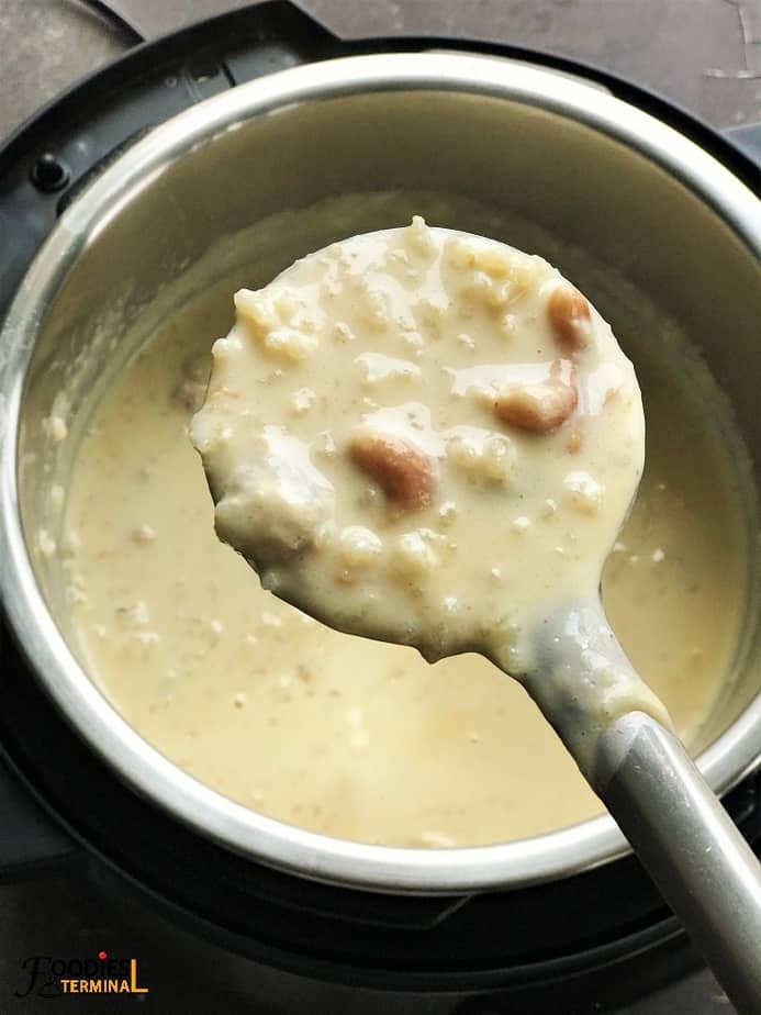 Rice Kheer in Instant Pot scopped with laddle