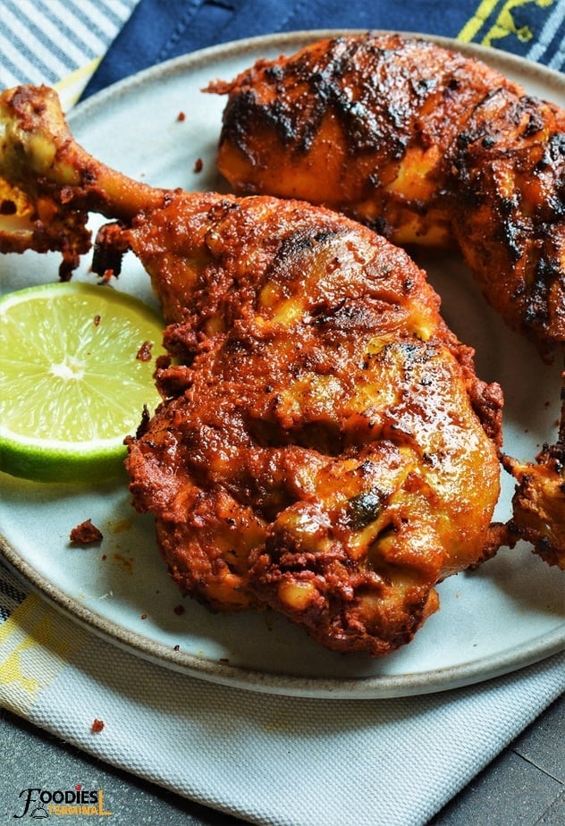 Instant pot Tandoori Chicken made with leg quarters served on a plate