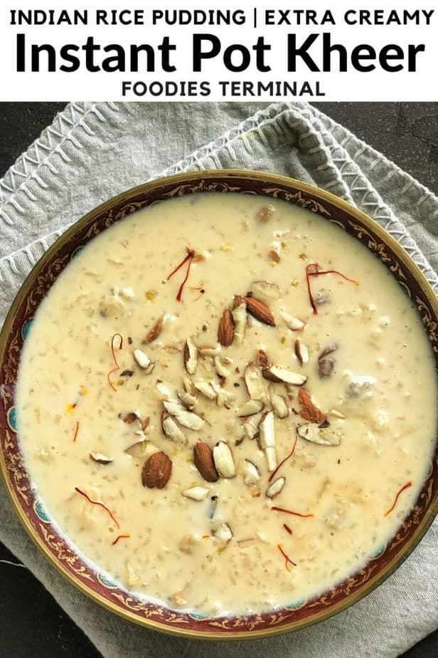 Kheer in a brass bowl with almonds & saffron