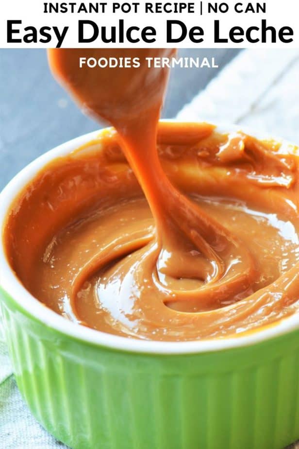 authentic dulce de leche with condensed milk forming ribbon in a green ramekin