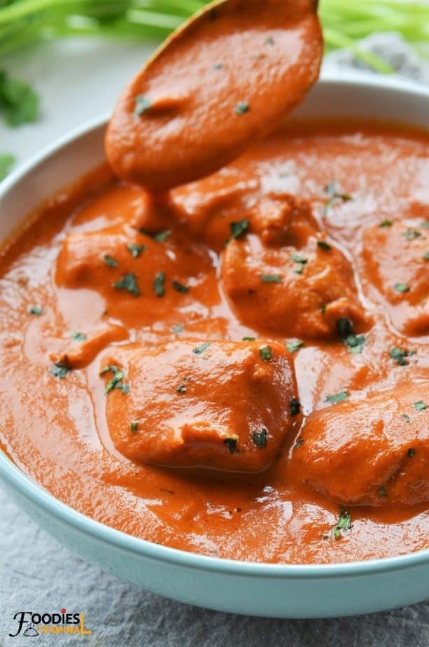 Instant pot butter chicken or chicken makhani in blue bowl