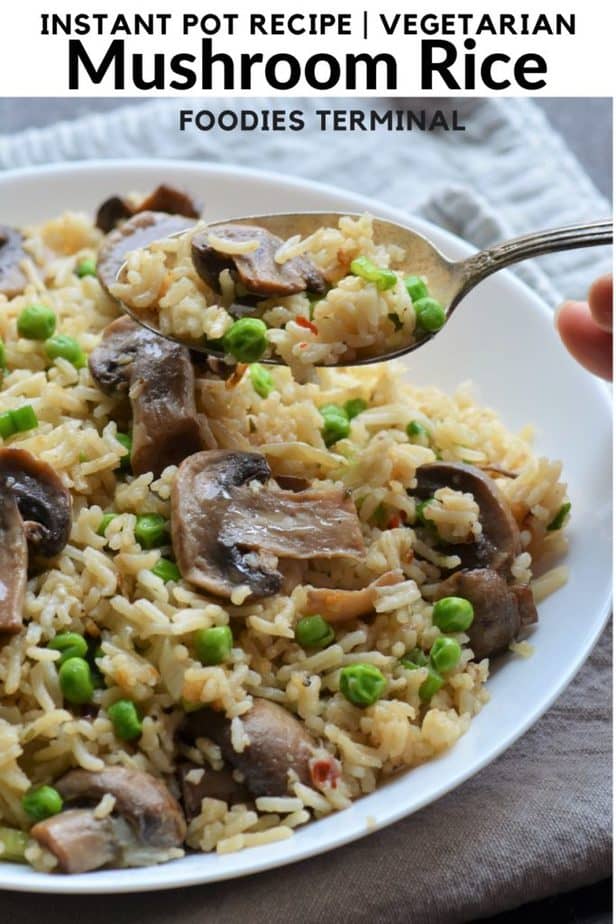 Instant Pot Mushroom Rice being lifted with a spoon