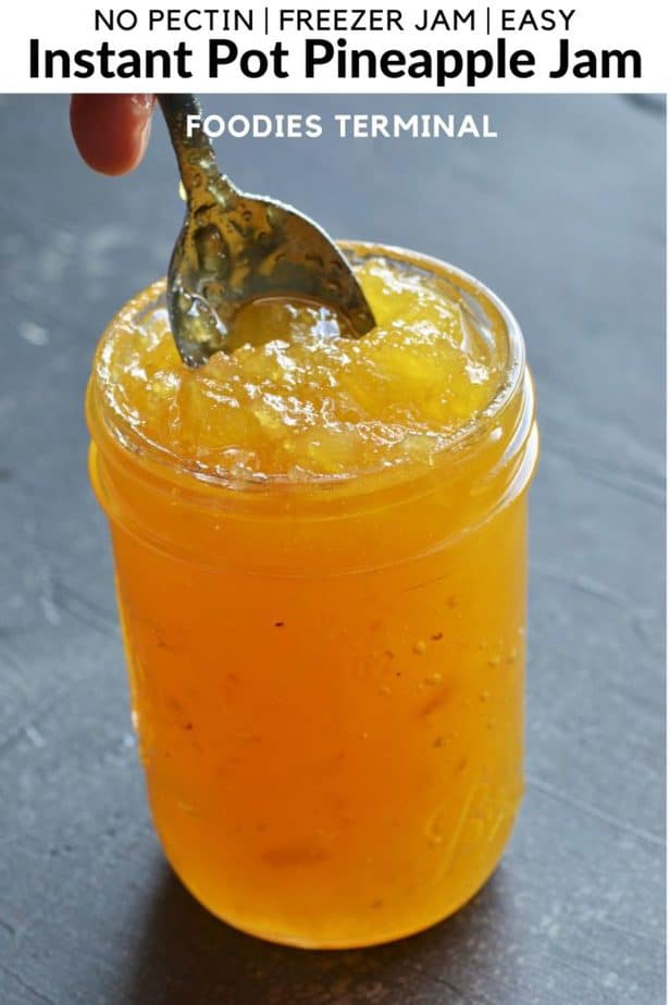 Pineapple Jam Instant Pot in a glass jar with a spoon