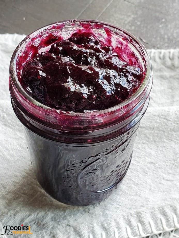 Instant Pot Blueberry Jam in a small mason jar