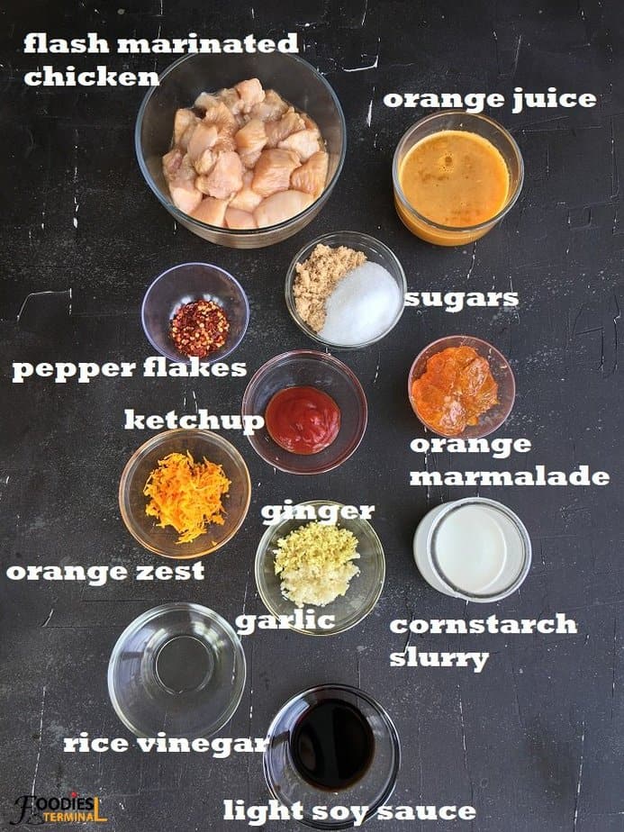 recipe ingredients in different size bowls on a black surface