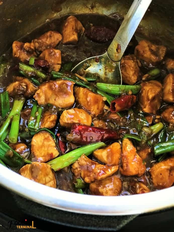 Mongolian Chicken made in instant pot with a steel ladle