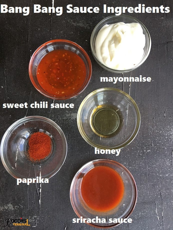 recipe ingredients in bowls on a black surface