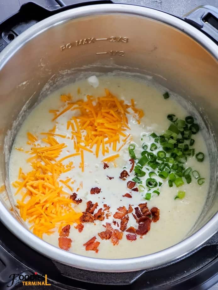Loaded Potato soup with cheddar, cream, bacon & scallions in instant pot