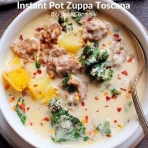 Instant Pot Zuppa Toscana soup served in white bowl with spoon