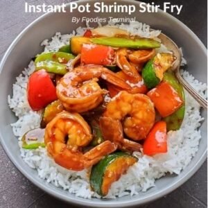 instant pot stir fry shrimp on white rice in a grey bowl