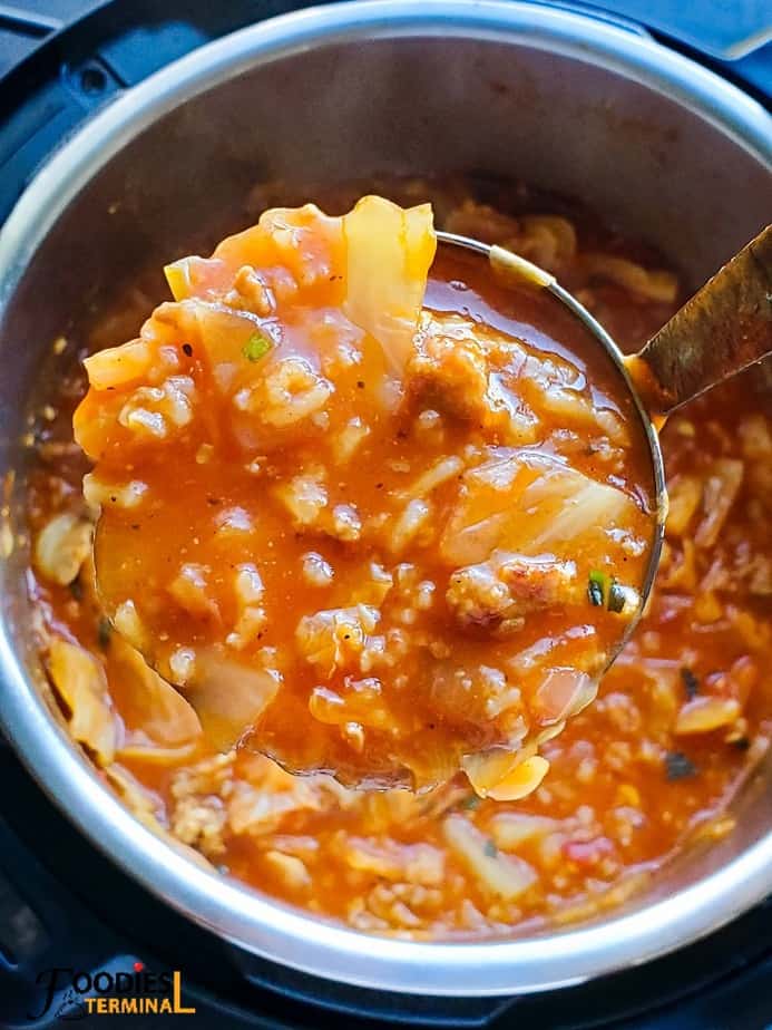 cabbage roll soup in the instant pot in a ladle