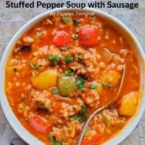 Instant Pot stuffed bell pepper soup in a white bowl garnished with parsley
