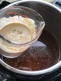 stabilized sour cream in a pyrex measuring cup