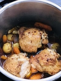 pressure cooked chicken thighs and vegetables in instant pot