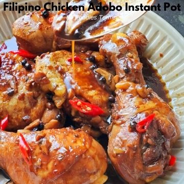drizzling adobo sauce over instant pot chicken adobo