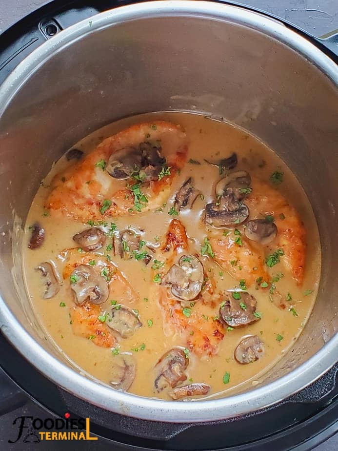 creamy chicken marsala in instant pot garnished with parsley