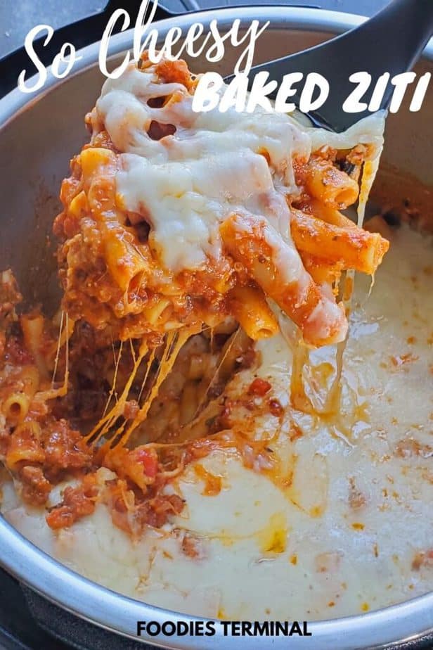 perfect instant pot baked ziti being lifted with a ladle from the instant pot