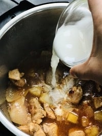 pouring cornstarch slurry inside instant pot