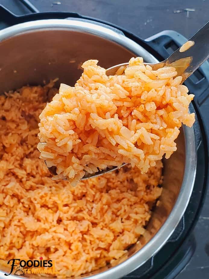 easy instant pot Mexican rice in a steel ladle