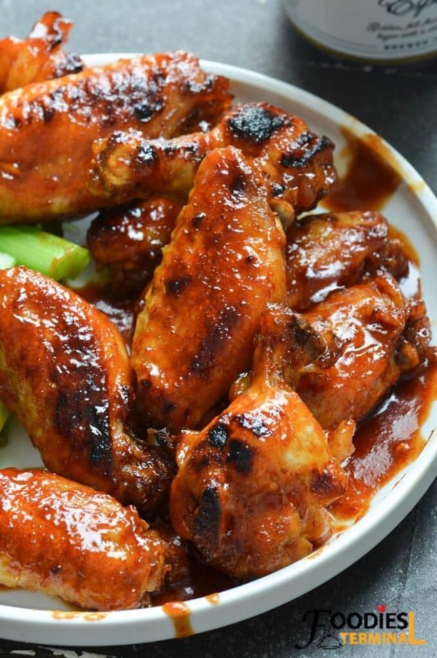 instant pot honey bbq chicken wings in a white plate