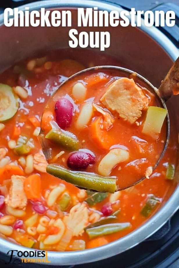 easy chicken minestrone soup being lifted with a ladle from instant pot