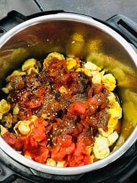 layered tortellini, tomatoes & sesaonings