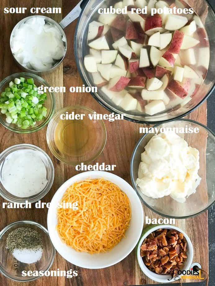 recipe ingredients in different size bowls place on a wooden surface