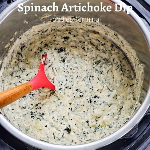 spinach artichoke dip in instant pot with a red & wooden ladle