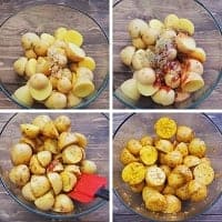 seasoned halved baby potatoes in a clear bowl